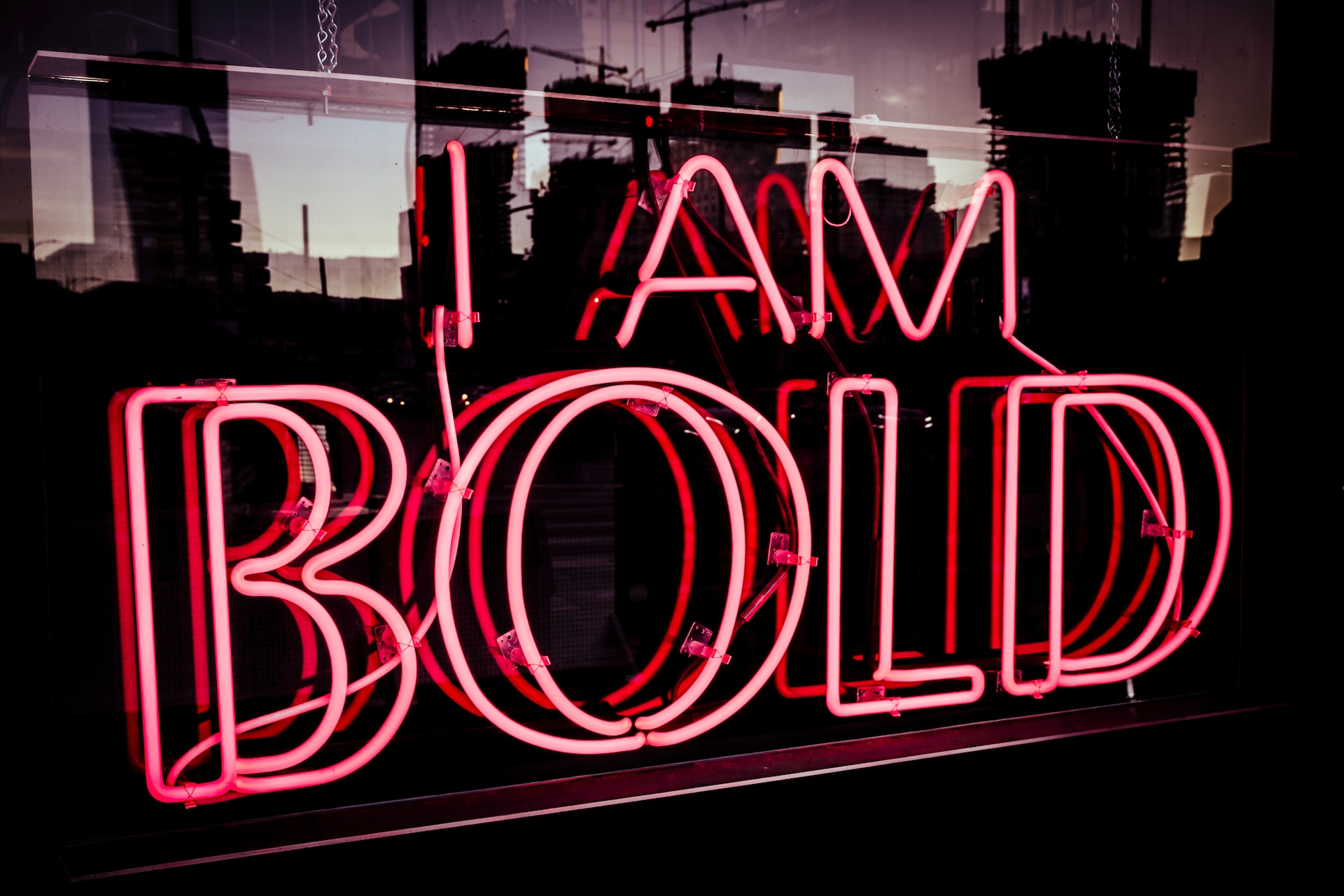 Neon sign that says "I am bold."
