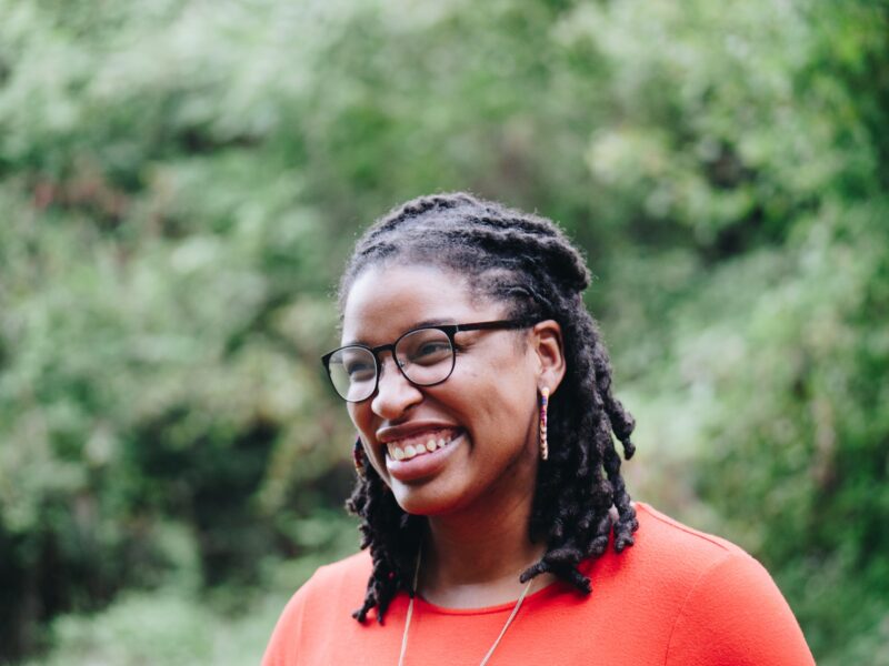 Smiling black woman wearing glasses